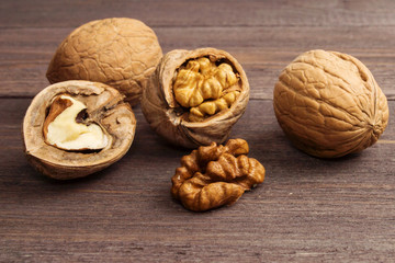 Handful of Walnuts on wooden background