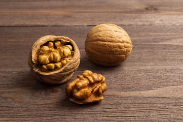 Handful of Walnuts on wooden background