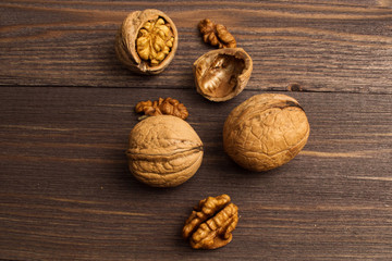 Handful of Walnuts on wooden background