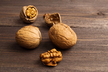 Handful of Walnuts on wooden background