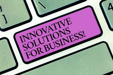 Text sign showing Innovative Solutions For Business. Conceptual photo Modern ideas applied to companies Keyboard key Intention to create computer message pressing keypad idea