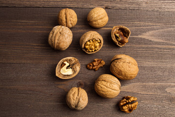 Handful of Walnuts on wooden background