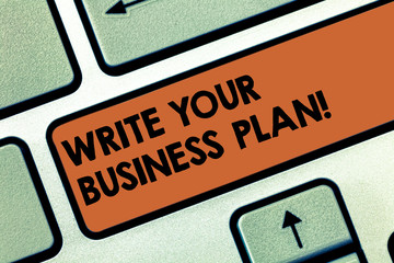 Text sign showing Write Your Business Plan. Conceptual photo Establish steps to accomplish company goals Keyboard key Intention to create computer message pressing keypad idea