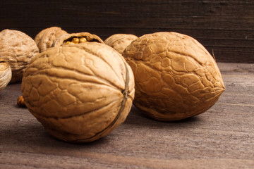 Handful of Walnuts on wooden background