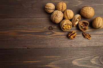 Handful of Walnuts on wooden background