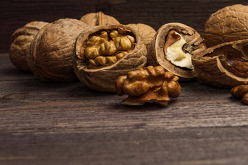 Handful of Walnuts on wooden background