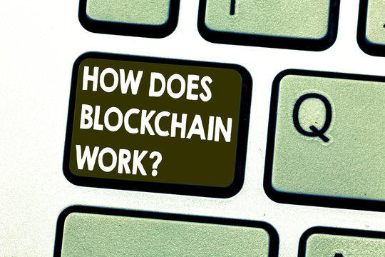 Text sign showing How Does Blockchain Work. Conceptual photo Decentralized money trading cryptocurrency Keyboard key Intention to create computer message pressing keypad idea