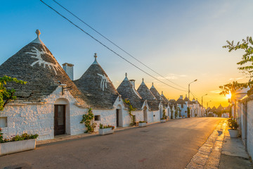 Trulli houses in Alberobello city at sunset time,  Apulia, Italy