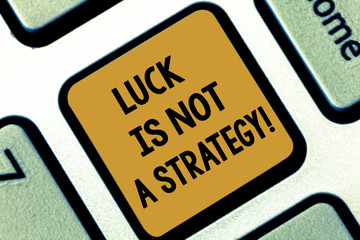 Text sign showing Luck Is Not A Strategy. Conceptual photo It is not being Lucky when planned intentionally Keyboard key Intention to create computer message pressing keypad idea