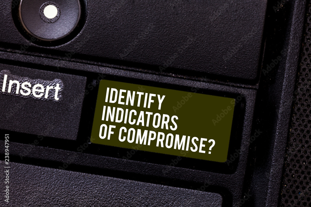 Aufkleber handwriting text writing identify indicators of compromise. concept meaning detect malware online at