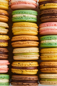 Close up of macarons in rows in various colors