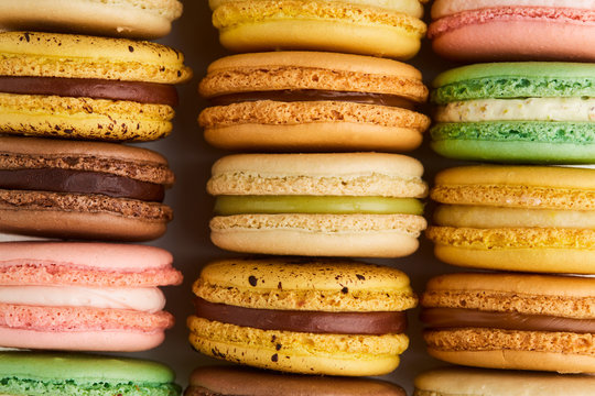 Close up of macarons in rows in various colors