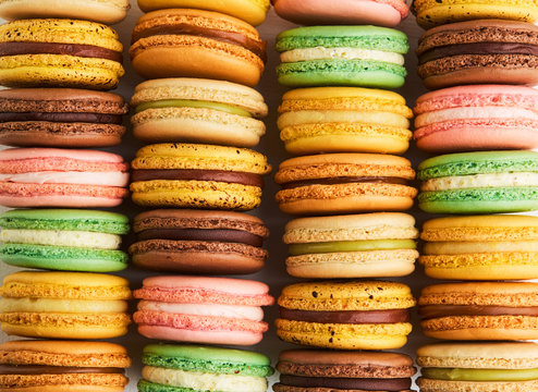 Close up of macarons in rows in various colors