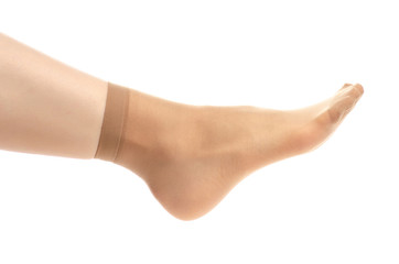 Female legs in nylon socks on white background. Isolation