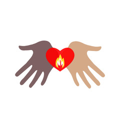 Obraz premium Two hands of different skin colors holding a burning heart.