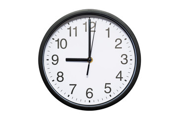 Wall clock shows time 9 o'clock on white isolated background. Round wall clock - front view. Twenty...