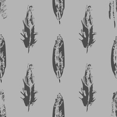 Vector Grunge bird feathers seamless pattern on Gray background