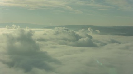 Aerial Flying Through Clouds