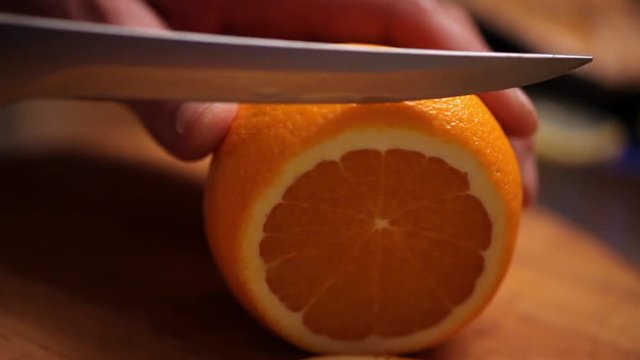 Cook cuts Orange