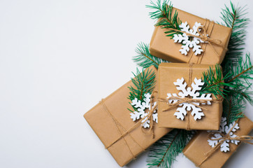 Christmas Gifts with Fir Branches on White Background, Winter Holidays Concept