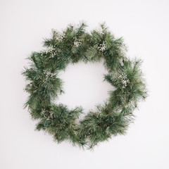 New Year interior. Wreath of spruce  with garland. Christmas decorations 