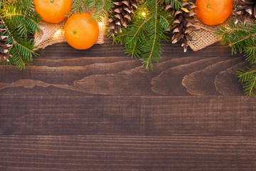 Christmas fir branches border with wooden background - 238956794