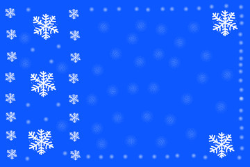 Snowflakes on a blue background. Christmas version of snow.