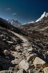 Fototapeta na wymiar Country road in the mountains. Himalayas. Gangotri, Gaumukh, India..