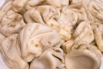 Khinkali - Georgian traditional food. Handmade rustic worldwide recipe book
