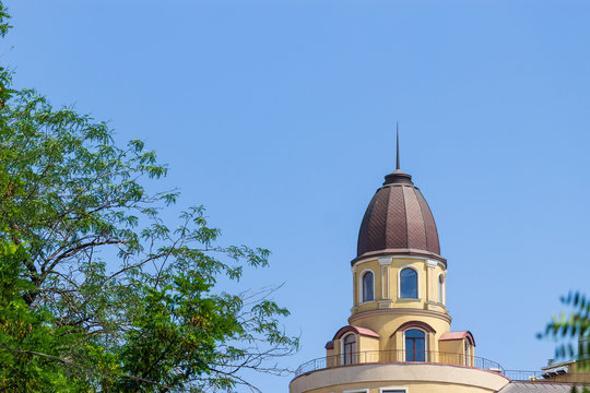 A building with a spire that acts as a lightning rod. Sophisticated architecture of the 19th century, background