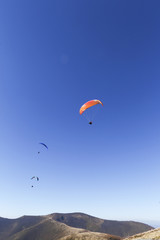 Fototapeta na wymiar paragliding, good paragliding, paragliding high in the mountains