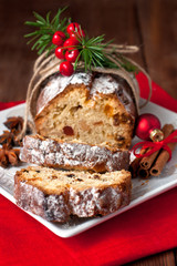Stollen, traditional Christmas cake with dried fruits and nuts. Christmas holiday food