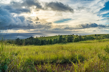 Dramatic clouds over the ocean, looking west from the first pull out on highway 550, Waimea, Kauai,...
