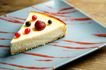 Slice of cheesecake on plate.