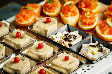 Various mini tarts closeup served as appetizer. 