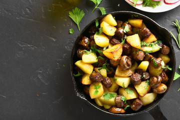 Baked potatoes with mushroom and sausages