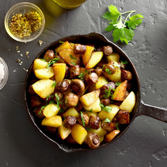 Fried potatoes with mushroom and sausage