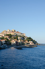 Small fishing village in Liguria. Horizontal view with sea and blue sky.