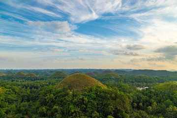 Fototapeta na wymiar Amazingly shaped Chocolate hills on sunny day on Bohol island, Philippines