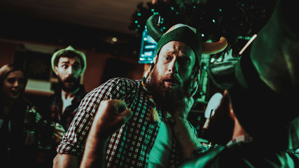 Two Men Fight In Pub. Saint Patrick's Day Concept.