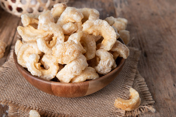 Pork rinds also known as chicharon or chicharrones , kab moo