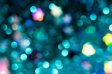 Colorful glitter abstract background with bokeh