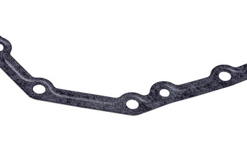 Seal gasket for gearbox pallet, replaceable car part close-up isolated on white background.