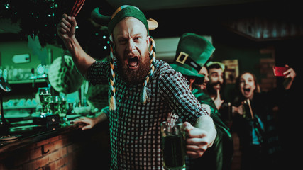 Man In Funny Hat Celebrates St Patrick's Day.