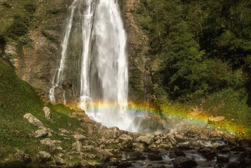 Waterfall Oniori in Georgia with rainbow in a sunny day.