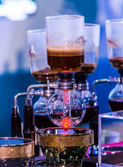 Showcase Syphon Coffee maker by syphonist./ Syphon Coffee or Vacuum Coffee is full immersion tasteful, this process show mix coffee beans into boiling water.
