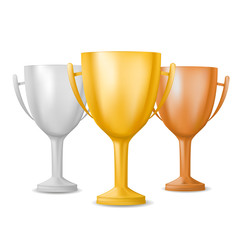Realistic isolated winner cup. Gold, silver and bronze trophy on white background