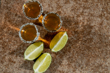Golden tequila with lemon and salt. Drinks, Liquor