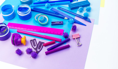 School accessories are laid out in the form of a rainbow. white background.