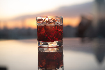 red cocktail sunset